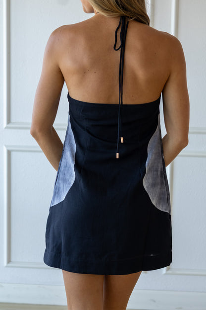 Black dress with a unique design on a white background